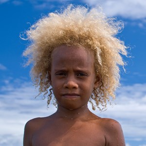 melanesian child with naturally blonde hair